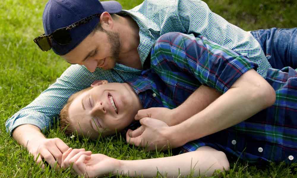 smiling gay couple